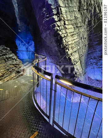 waterfall in cave with colored lights cascate del varone waterfall in cave with colored lights cascate del varone 81196197