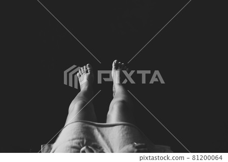 Close up legs woman sitting and feeling depression at sea,Mental disorder health care,World suicide prevention day concept,Black and white toned 81200064