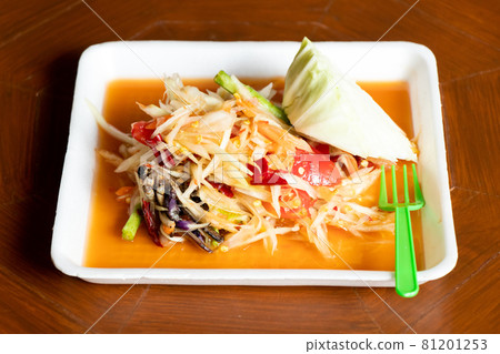 Papaya salad, Thai food name Som Tum, on white foam plate background 81201253
