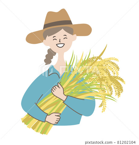 A smiling woman harvesting rice 81202104
