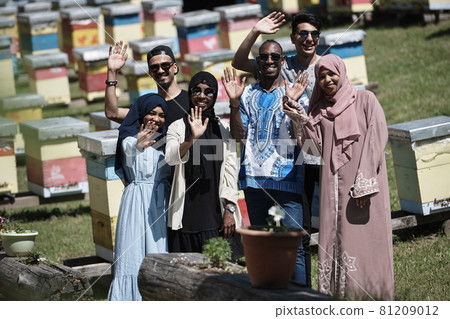 people group visiting local honey production farm 81209012