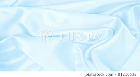 Smooth elegant blue silk or satin luxury cloth texture as abstract background. Luxurious Christmas background or New Year background design Smooth elegant blue silk or satin luxury cloth texture as abstract background. Luxurious Christmas background or New Year background design 81210532