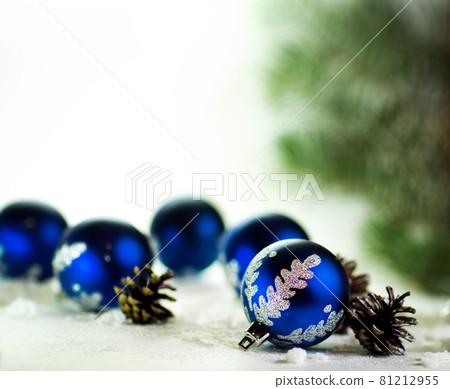 blue Christmas balls on white background with fir cones blue Christmas balls on white background with fir cones 81212955