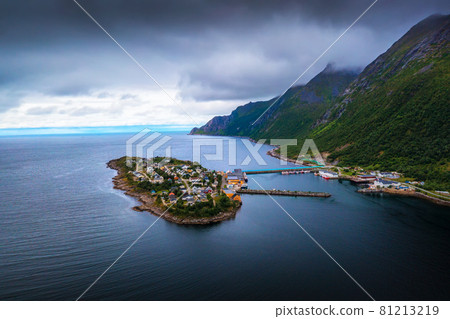 Aerial view of the Husoy fishing village on the Senja Island, Norway Aerial view of the Husoy fishing village on the Senja Island, Norway 81213219