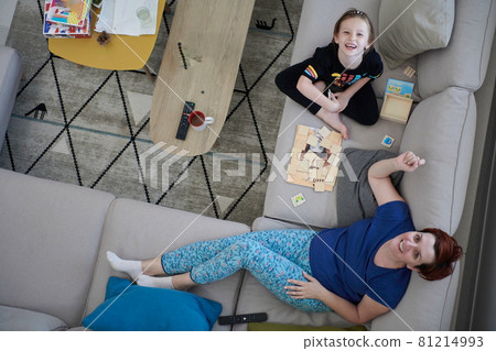 mother and daughter at home playing memory game mother and daughter at home playing memory game 81214993