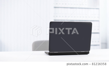 open laptop on the Desk from a businessman. open laptop on the Desk from a businessman. 81216358