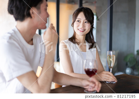 Couple drinking at the bar Couple drinking at the bar 81217195