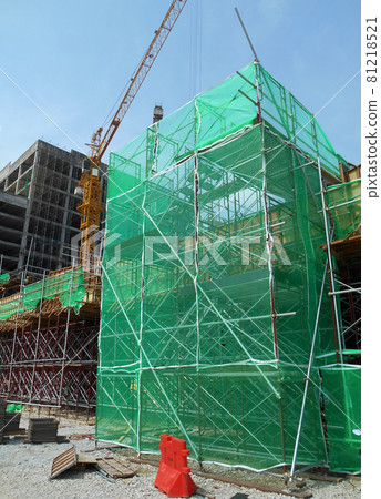 MALACCA, MALAYSIA -MAY 04, 2016: Temporary access and staircase supported by reinforced scaffolding at the construction site.  81218521