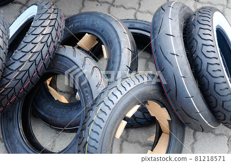 SEPANG, MALAYSIA -OCTOBER 25, 2015: Racing motorcycle tire display for public during 2015 MotorGP tournament in Sepang Circuit. 81218571