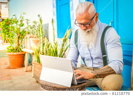 Senior man with a phone Senior man with a phone 81218770