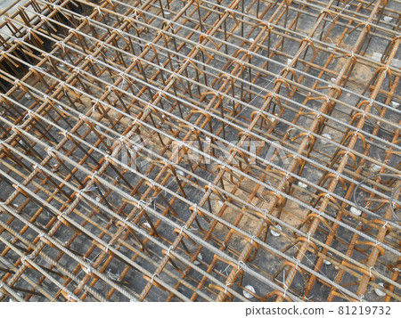 SELANGOR, MALAYSIA -MAY 18, 2016: Hot rolled deformed steel bars or steel reinforcement bar tied together before cast in the concrete. Its function is to increase the concrete strength.  81219732