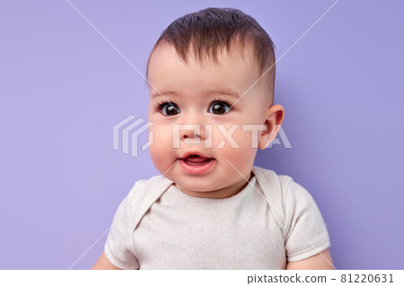 Caucasian baby child is looking at side enjoying adopted life. Concept of happy family Caucasian baby child is looking at side enjoying adopted life. Concept of happy family 81220631