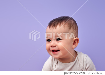Happy little child is smiling enjoying adopted life. Concept of happy family 81220632