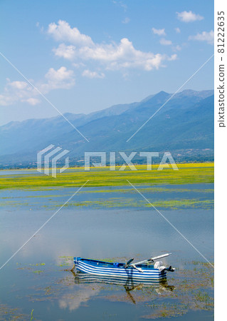 Greece, Boat in the colors of Greece on Lake Kerkini Greece, Boat in the colors of Greece on Lake Kerkini 81222635