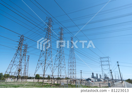 electrical power lines. pylon producing energy. voltage transmission on electric tower electrical power lines. pylon producing energy. voltage transmission on electric tower 81223013