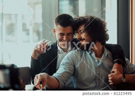 Portrait of multiethnic diverse gay LGBT romantic male couple embracing and showing their love 81223495