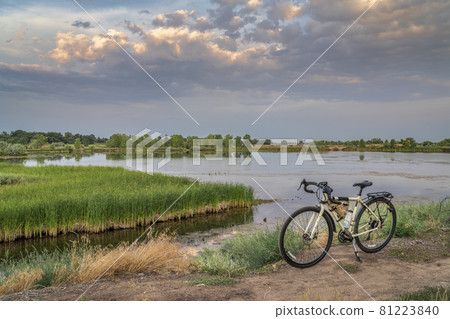 touring bicycle on lake shore in one of Fort Collins natural areas touring bicycle on lake shore in one of Fort Collins natural areas 81223840