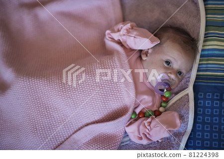 happy newborn little baby smilling 81224398