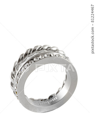 Knotted sparkly twin silver ring with zircons isolated on white background 81224467