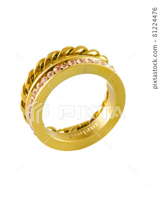 Knotted sparkly twin golden ring with zircons isolated on white background 81224476