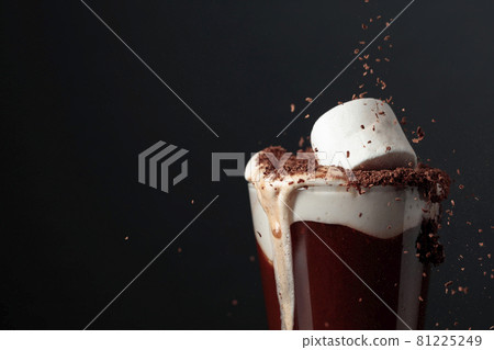 Hot chocolate with marshmallows sprinkled with chocolate crumbs. Hot chocolate with marshmallows sprinkled with chocolate crumbs. 81225249