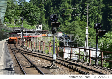 Kurobe Gorge in summer, trolley train at Keyakidaira Station Kurobe Gorge in summer, trolley train at Keyakidaira Station 81226827