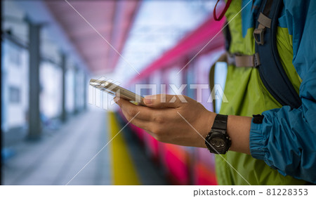 A man going out by train 81228353