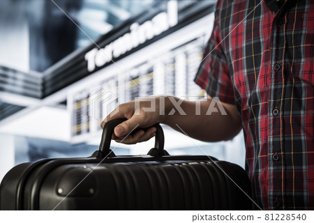 Man traveling by plane 81228540