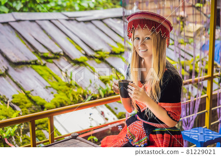 A female tourist dressed in the traditional... - Stock Photo [81229021] -  PIXTA