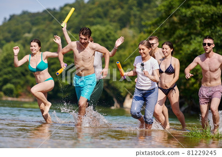 group of happy friends having fun on river group of happy friends having fun on river 81229245