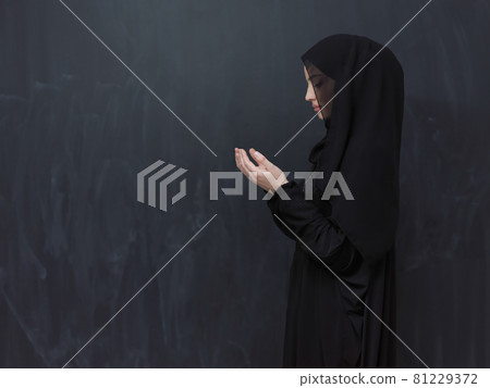 Portrait of young Muslim woman making dua Portrait of young Muslim woman making dua 81229372