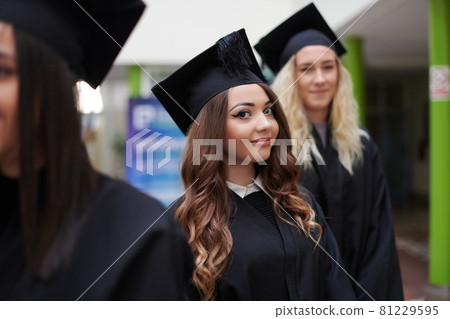 Group of diverse international graduating students celebrating Group of diverse international graduating students celebrating 81229595