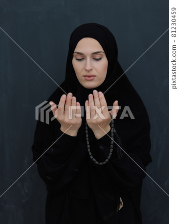 Portrait of young Muslim woman making dua Portrait of young Muslim woman making dua 81230459