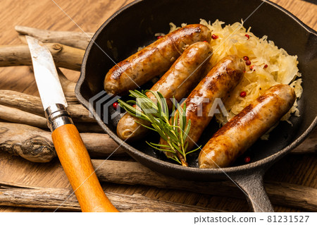 Photo of baked fresh handmade sausage 81231527