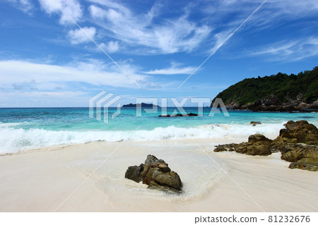 The blue sea and sky with mountain and rock The blue sea and sky with mountain and rock 81232676