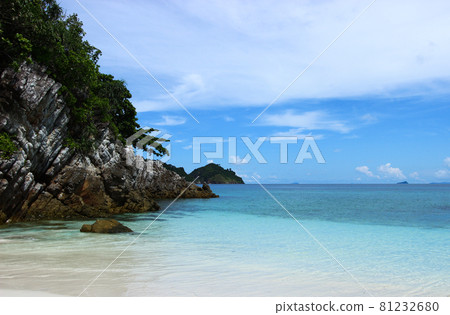 The blue sea and sky with mountain and rock The blue sea and sky with mountain and rock 81232680