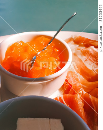 Breakfast outdoors in summer, ham, jam, butter and ham Breakfast outdoors in summer, ham, jam, butter and ham 81233463