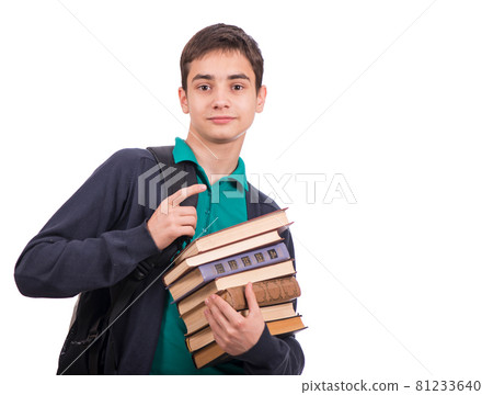 schoolboy holding a stack of books, textbook isolated on white background . Close-up. schoolboy holding a stack of books, textbook isolated on white background . Close-up. 81233640