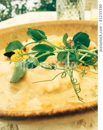 Traditional cuisine, culinary and gourmet travel, homemade dumplings in mushroom sauce recipe, polish pierogi in luxury restaurant in Old Town 81235590