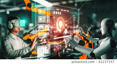 Mechanized industry robot and human worker working together in future factory 81237147