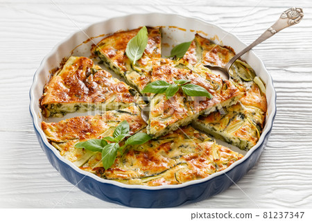 Scarpaccia, italian zucchini tart in a baking dish Scarpaccia, italian zucchini tart in a baking dish 81237347