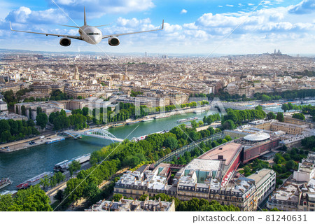 Airplane flying over the city of Paris Airplane flying over the city of Paris 81240631