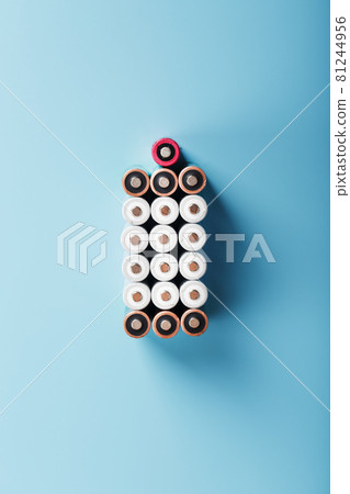 AA batteries are arranged in the form of a large battery on a blue background. 81244956