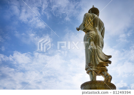 Golden Buddha statue standing at Wat Phra That Khao Noi, Nan Province, Thailand Golden Buddha statue standing at Wat Phra That Khao Noi, Nan Province, Thailand 81249394