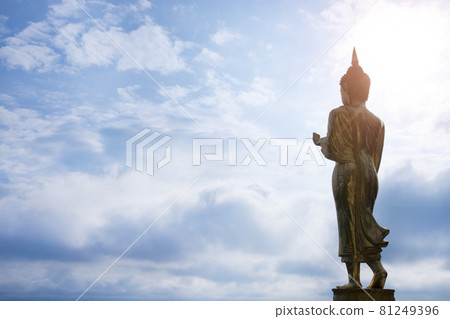Golden Buddha statue standing at Wat Phra That Khao Noi, Nan Province, Thailand 81249396