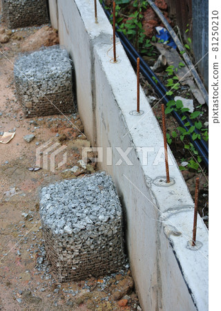 JOHOR, MALAYSIA -JULY 18, 2016: Precast concrete retaining wall at the construction site. JOHOR, MALAYSIA -JULY 18, 2016: Precast concrete retaining wall at the construction site. 81250210