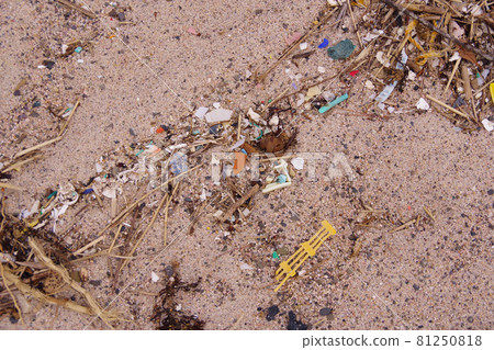 Waste plastic, plastic trash washed up on a sandy beach, microplastic, environmental destruction, environmental problems Waste plastic, plastic trash washed up on a sandy beach, microplastic, environmental destruction, environmental problems 81250818
