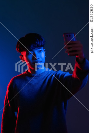 phone selfie gadget people man photo neon light 81252630