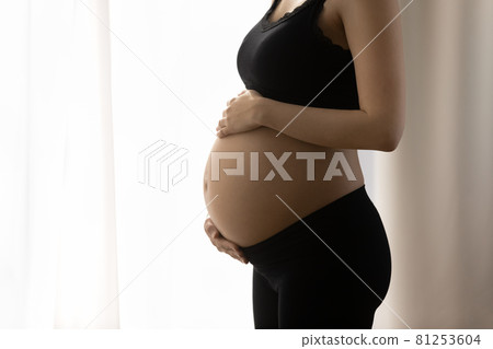 Close up of bare baby bump with good smooth skin 81253604
