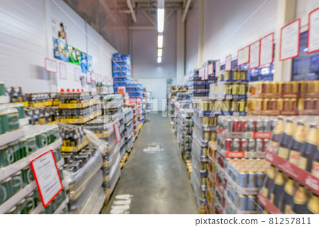 Blurred image of the alcohol supermarket storage. Blurred image of the alcohol supermarket storage. 81257811